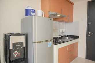 Common Space 4 Homey and Comfortable 2BR Belmont Residence Puri Apartment By Travelio