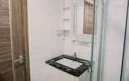 In-room Bathroom 2 Homey and Wonderful 3BR Sky House BSD Apartment By Travelio