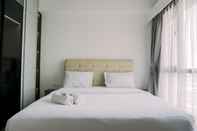 Bedroom Homey and Wonderful 3BR Sky House BSD Apartment By Travelio