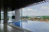 Swimming Pool Homey and Best Deal 1BR The Ayoma Apartment By Travelio