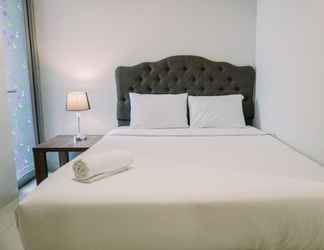 Bedroom 2 Comfy and Nice 1BR at The Mansion Kemayoran Apartment By Travelio