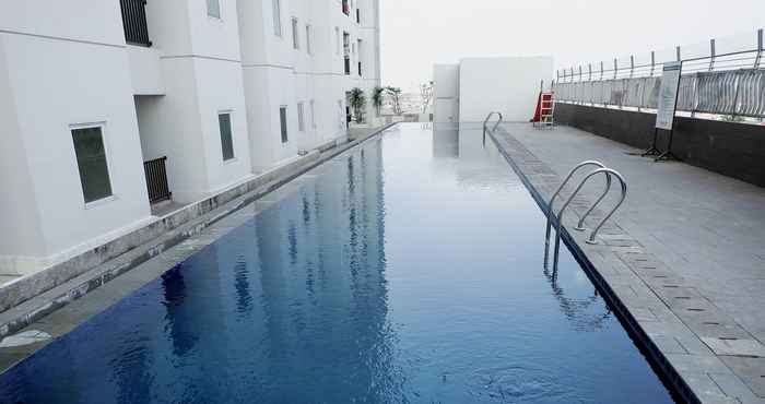 Swimming Pool Warm and Cool 2BR at Northland Ancol Apartment By Travelio