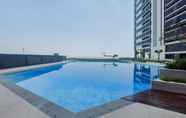 Swimming Pool 6 Cozy Studio and Well Furnished Collins Boulevard Apartment By Travelio