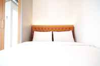 Kamar Tidur Cozy Stay and Tidy Studio Apartment at Suncity Residence By Travelio