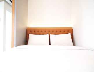 Kamar Tidur 2 Cozy Stay and Tidy Studio Apartment at Suncity Residence By Travelio