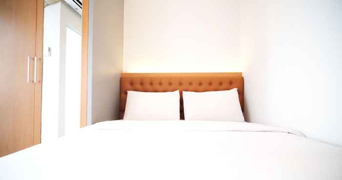 Kamar Tidur Cozy Stay and Tidy Studio Apartment at Suncity Residence By Travelio