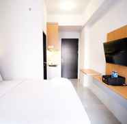 Kamar Tidur 2 Cozy Stay and Tidy Studio Apartment at Suncity Residence By Travelio