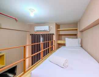 Bedroom 2 Cozy and Comfortable Studio Dave Apartment By Travelio