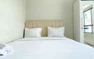 Bedroom 2 Modern Look Studio at Apartment Springlake Summarecon Bekasi By Travelio