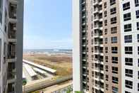 Exterior Fully Furnished Studio at 11th Floor Apartment Tokyo Riverside PIK 2 By Travelio