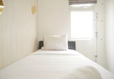 Bedroom 3 Classic and Modern 2BR at Green Pramuka City Apartment By Travelio