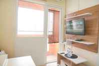 Sảnh chờ Classic and Modern 2BR at Green Pramuka City Apartment By Travelio