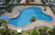 Swimming Pool 7 Serene 2BR at Apartment Gateway Pasteur By Travelio