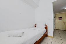 寝室 Cozy Stay Studio at M-Town Residence Apartment By Travelio