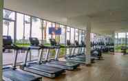 Fitness Center 6 Warm and Homey Studio at 28th Floor Gold Coast Apartment By Travelio