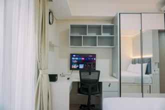 Bilik Tidur 4 Warm and Homey Studio at 28th Floor Gold Coast Apartment By Travelio