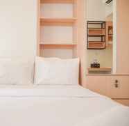 Bedroom 2 Enjoy and Comfy Studio at Tokyo Riverside PIK 2 Apartment By Travelio