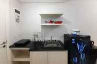 Ruang Umum Homey and Good Choice Studio at Barsa City Apartment By Travelio