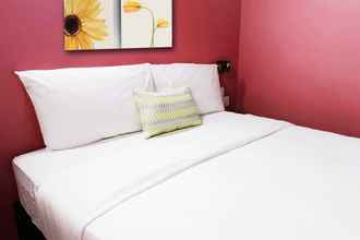 Kamar Tidur 4 Glow Hotel