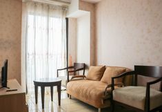 Lobby 3 Minimalist 2BR Apartment at Tamansari Panoramic By Travelio