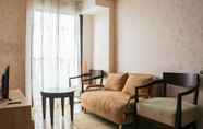 Lobby 3 Minimalist 2BR Apartment at Tamansari Panoramic By Travelio