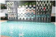 Kolam Renang Neu Suites by PapayaStay