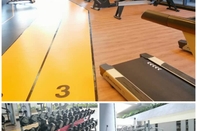 Fitness Center Neu Suites by PapayaStay