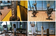 Fitness Center 5 Neu Suites by PapayaStay