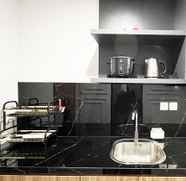 Others 4 Cozy Studio at Delft Ciputra Apartment Makassar By Travelio