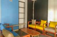 Lobby Minimalist and Cozy Living Studio Dave Apartment By Travelio