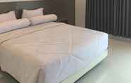 Kamar Tidur 2 Genio Syariah Hotel, Solo