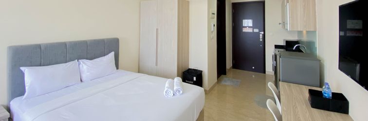 Lobby Cozy and Well Furnished Studio Menteng Park Apartment By Travelio