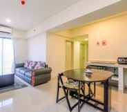 Lobby 6 Cozy Design and Spacious 2BR with Working Room Meikarta Apartment By Travelio