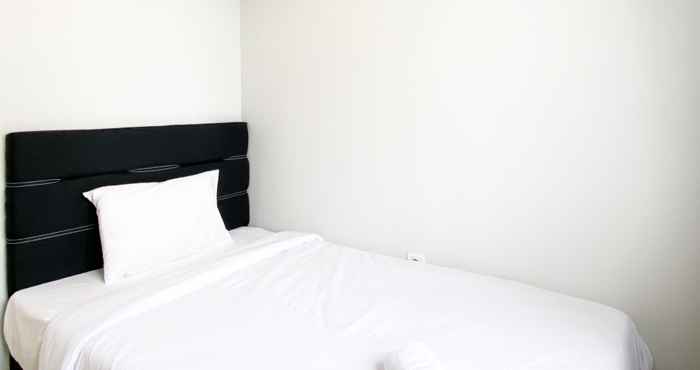 ห้องนอน Cozy and Best Deal 3BR Meikarta Apartment By Travelio