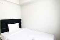 ห้องนอน Cozy and Best Deal 3BR Meikarta Apartment By Travelio