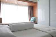 ห้องนอน Cushy Apartment with Mount Merapi View