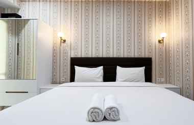 Bedroom 2 Strategic Studio Room at Apartment Delft Ciputra Makassar By Travelio