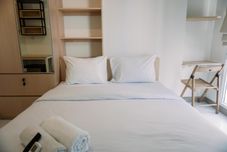 Bilik Tidur Comfy and Relax Studio at Tokyo Riverside PIK 2 Apartment By Travelio