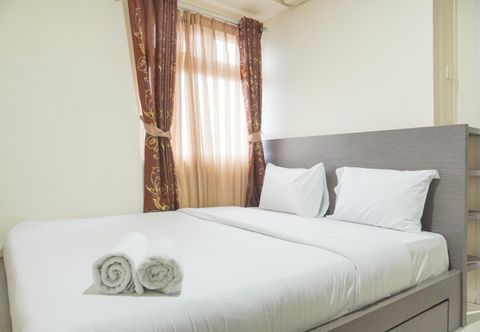 Bedroom Relaxing and Good Deal and Relaxing 2BR Green Pramuka City Apartment By Travelio