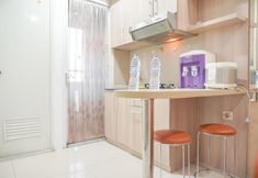 Common Space 5 Relaxing and Good Deal and Relaxing 2BR Green Pramuka City Apartment By Travelio
