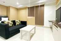 Lobby Simply Look Studio Apartment at Azalea Suites By Travelio
