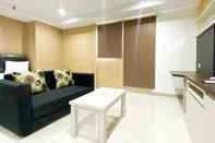 Lobi Simply Look Studio Apartment at Azalea Suites By Travelio