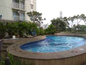 Swimming Pool 4 Cozy and Warm Living Studio Bogor Valley Apartment By Travelio