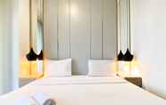 Bedroom 5 Comfort and Elegant 1BR Sudirman Suites Apartment By Travelio