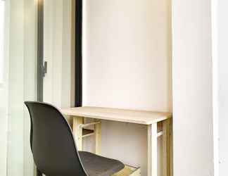 Bedroom 2 Comfort and Elegant 1BR Sudirman Suites Apartment By Travelio