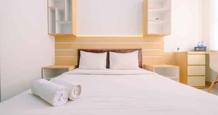 Kamar Tidur Well Design and Homey Studio Transpark Cibubur Apartment By Travelio