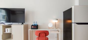 Common Space 5 Metropolitan Studio Room Tamansari Tera Residence Apartment By Travelio