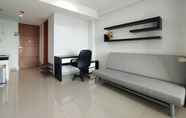 Lobby 5 Comfy and Nice 1BR at Dago Suites Apartment By Travelio