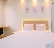 Bedroom 2 Homey and Good Studio at Transpark Cibubur Apartment By Travelio