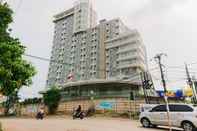 Lobi Modern and Best Deal 2BR Amazana Serpong Apartment By Travelio